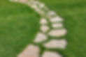 A Stone Path with grass on either side