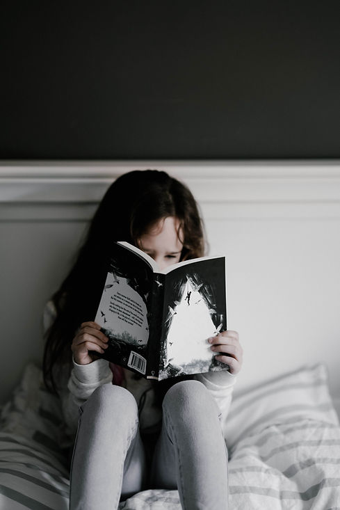 Child Reading Book