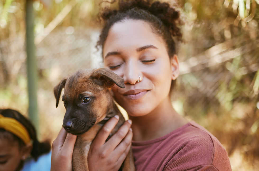 Woman Holding Puppy