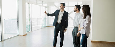 Lift consultant assessing an existing home and discussing placement options with homeowners.