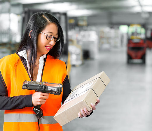 Warehouse worker scanning barcode inventory system Malaysia