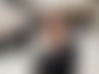 Confident woman professional standing on government building steps, representing women’s growing role in lobbying and advisory positions in South Africa’s policy landscape.