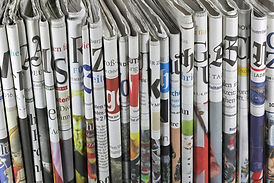 Folded Newspapers