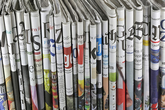 Folded Newspapers