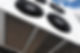 Close-up of industrial cooling fans mounted on a metal structure