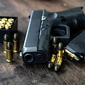 Handgun With Ammunition
