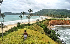 Woman Overlooking Beach Landscape
