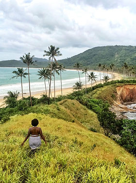 Woman Overlooking Beach Landscape