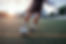 Playing soccer at sunset