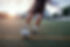 Playing soccer at sunset