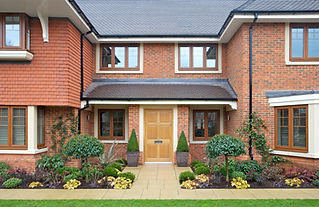 The front door and entrance area of a luxury new home