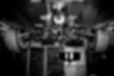Auto repair shop - modern car, low-angle view. Black and white