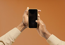 Holding Mobile Phone