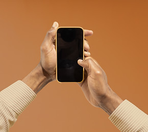 Holding Mobile Phone