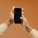 Holding Mobile Phone