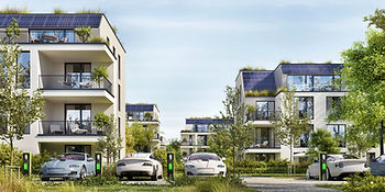 Buildings covered in greenery with electric cars parked outside