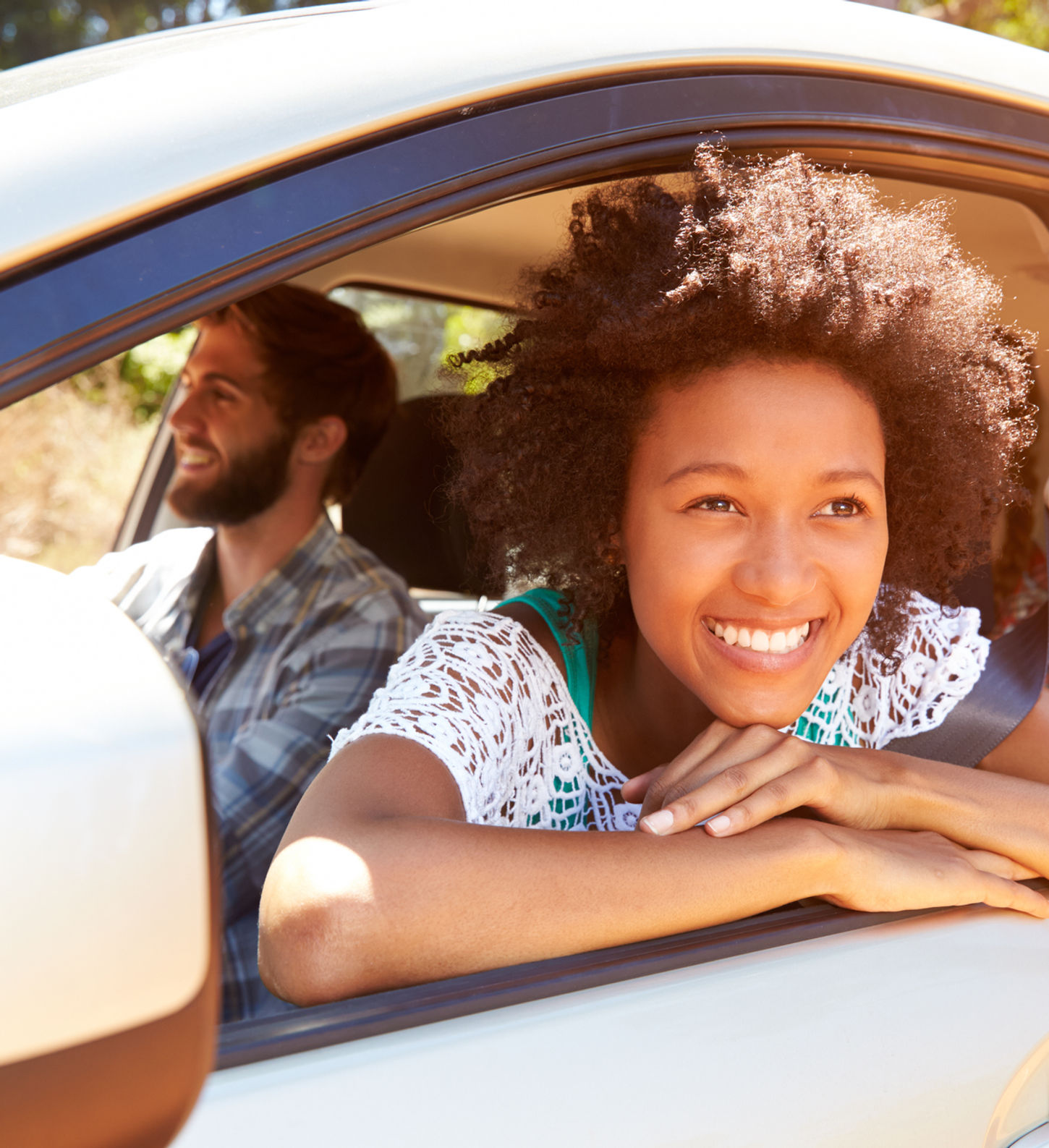 Woman Smiling in Car