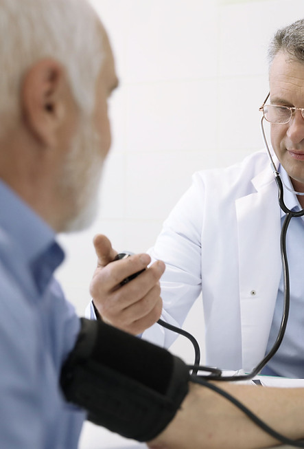 Doctor Measuring Blood Pressure