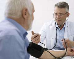 Doctor Measuring Blood Pressure