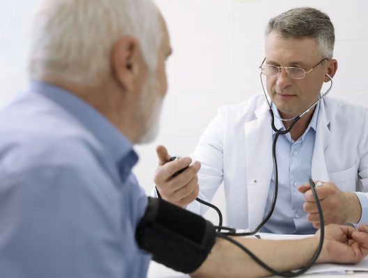 Doctor Checking Blood Pressure