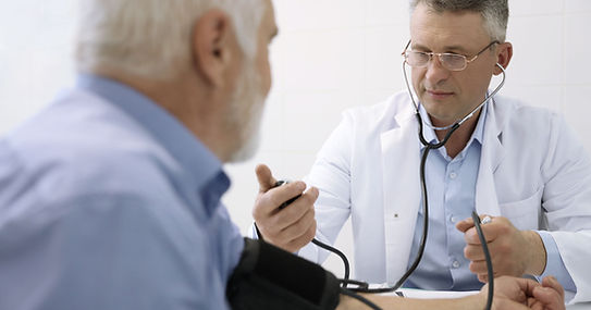 Doctor Measuring Blood Pressure