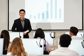 A professor giving lecture in classs