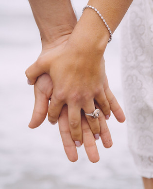 Engaged Couple Holding Hands