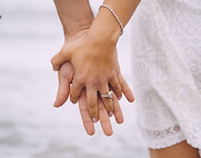 Engaged Couple Holding Hands