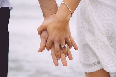 Engaged Couple Holding Hands