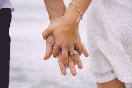Engaged Couple Holding Hands