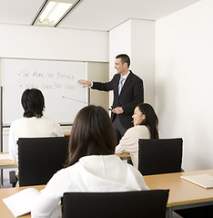 Adults in a classroom learning Fire Safety