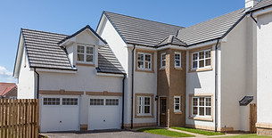 Rows of modern white detached houses