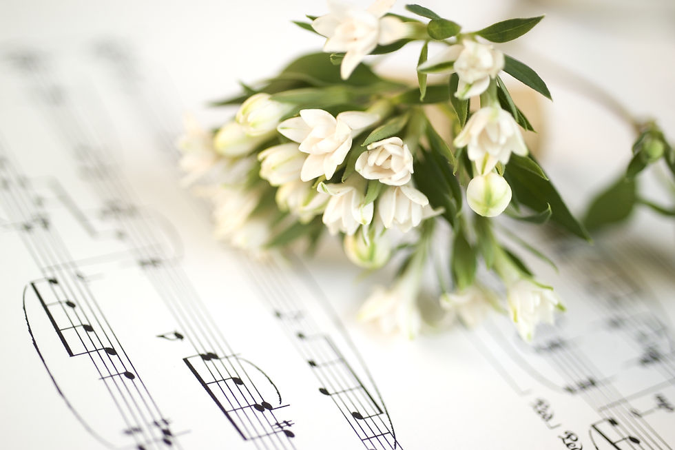 White flowers on a music book