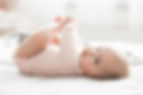 Baby Lying on Blanket