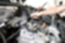 Mechanic repairing car in a garage
