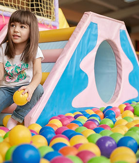 Girl Playing with Balls