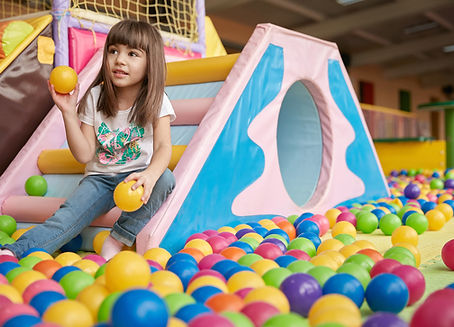 Girl Playing with Balls