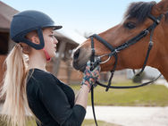 Horse rider wearing helmet