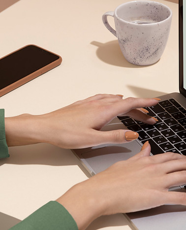 Hands Using Laptop