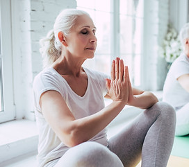 Senior Couple Doing Yoga