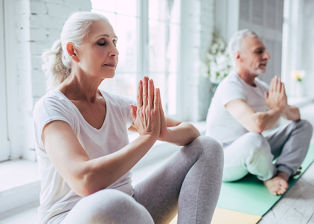 Senior Couple Doing Yoga