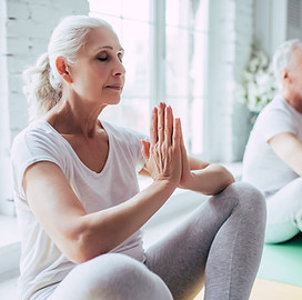 Senior Couple Doing Yoga