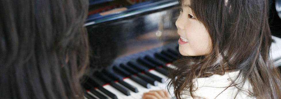 Child Playing the Piano