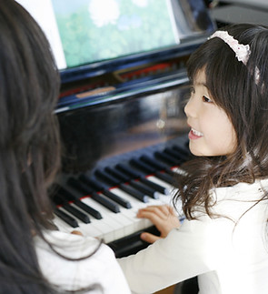 Child Playing the Piano