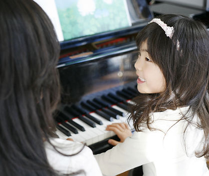 Child Playing the Piano