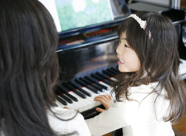 Child Playing the Piano