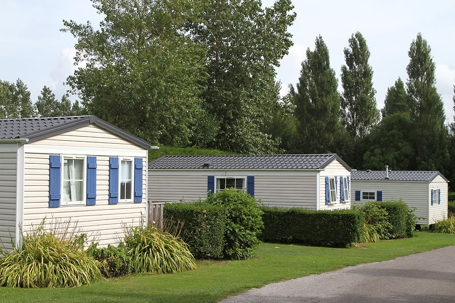 Static vacation or holiday caravans in a well tended and tranquil country woodland setting