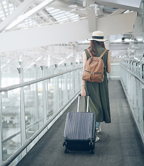 Traveler Walking In Airport