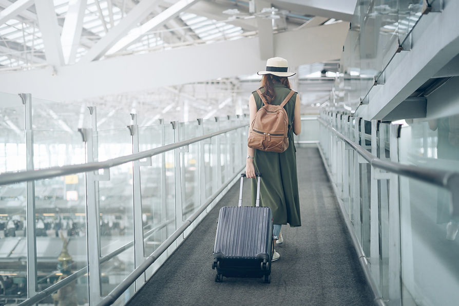Traveler Walking In Airport