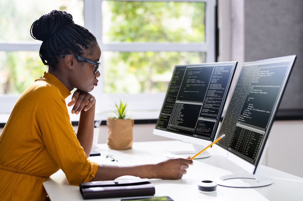 woman working in office coding